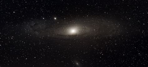 Andromeda Galaxy (M31) with satellite galaxies M31 and M110 [8K] : r/astrophotography