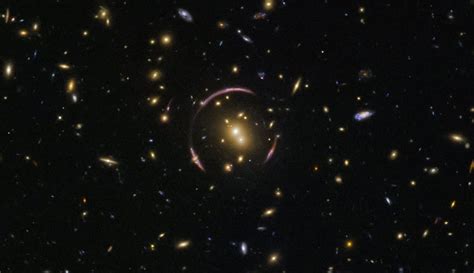 These graceful arcs are examples of a cosmic phenomenon known as an Einstein ring. : SpaceFans