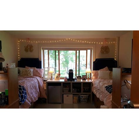 SUNY Oswego Dorm room with a custom built table and headboards #college ...