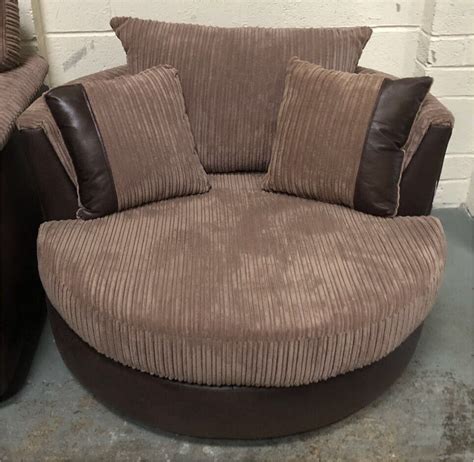 DFS Findlay Cord Fabric Swivel Cuddle Chair | in Swansea | Gumtree