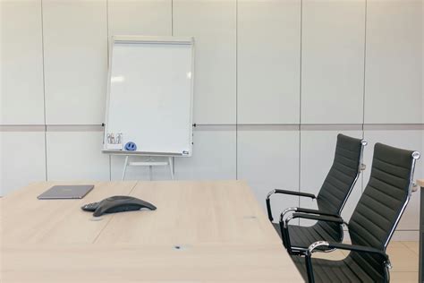 A Blank Whiteboard Inside the Conference Room · Free Stock Photo