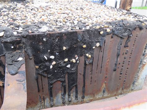 Pictures: Telltale Signs of a Coal Tar Pitch Roof | Roof Help