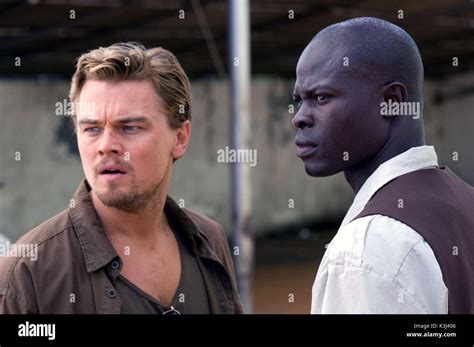 BLOOD DIAMOND LEONARDO DICAPRIO, DJIMON HOUNSOU Date: 2006 Stock Photo ...