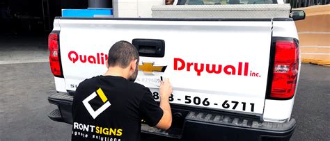 Promotional vehicle wrap installation process | Front Signs