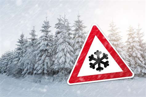 Premium Photo | Warning sign with snow flake for snowfall at the winter season