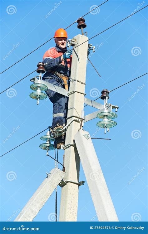 Electrician Lineman Repairman Worker At Climbing Work On Electric Post Power Pole Royalty-Free ...