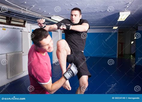 Knee Kick During Mma Training Stock Photo - Image: 50224140