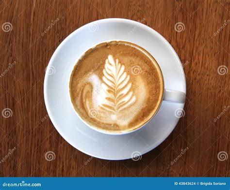 Cup of Frothy Coffee stock photo. Image of bubbles, frothy - 43843624