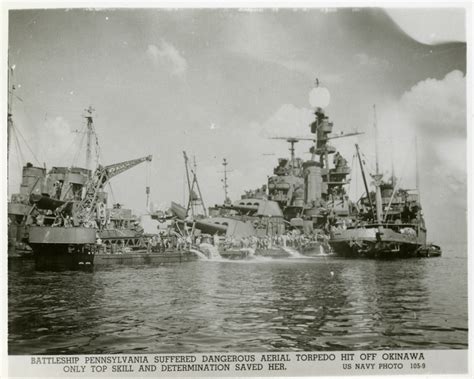 USS Pennsylvania (BB-38) undergoing repairs in open water off the coast ...