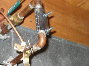 Use a Repair Clamp to Fix a Small Copper Pipe Leak - One Project Closer