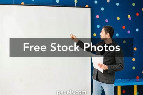 Teacher With A Projector Photos, Download The BEST Free Teacher With A ...