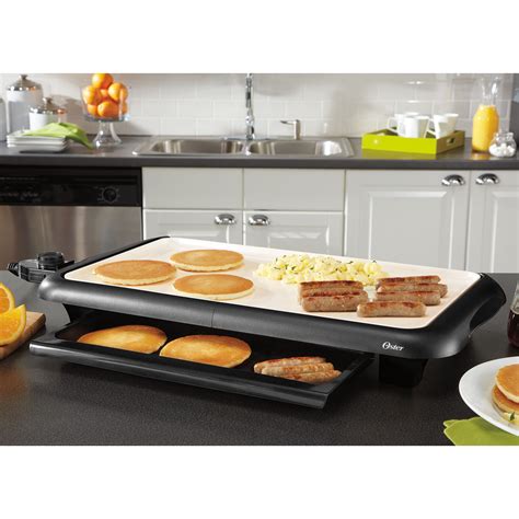 Oster® Titanium Infused DuraCeramic™ 10" x 18-1/2" Griddle w/ Warming Tray - CKSTGRFM18WT-033 ...