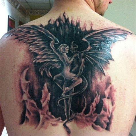 Angels and demons tattoo on back - Tattooimages.biz