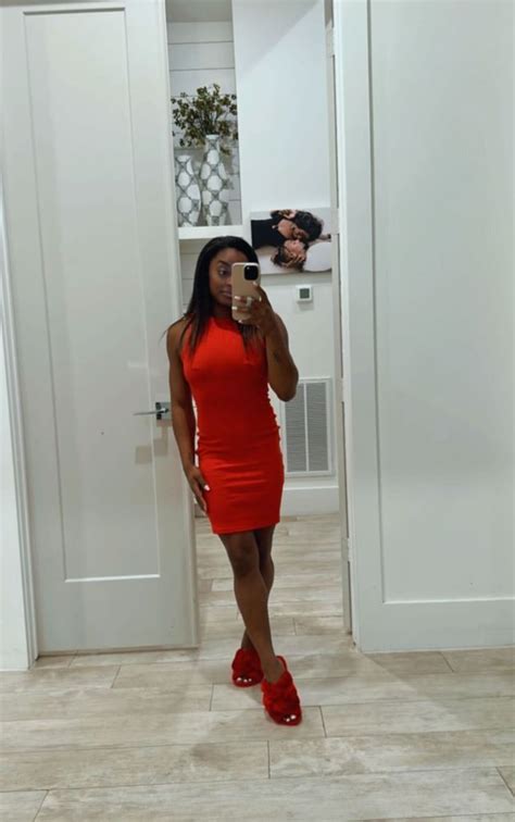 Simone Biles in Red-Hot Dress and Matching Fuzzy Slides – Footwear News