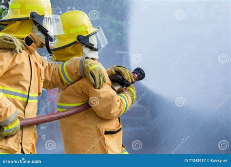 Firefighter Fighting for a Fire Attack Stock Image - Image of male ...