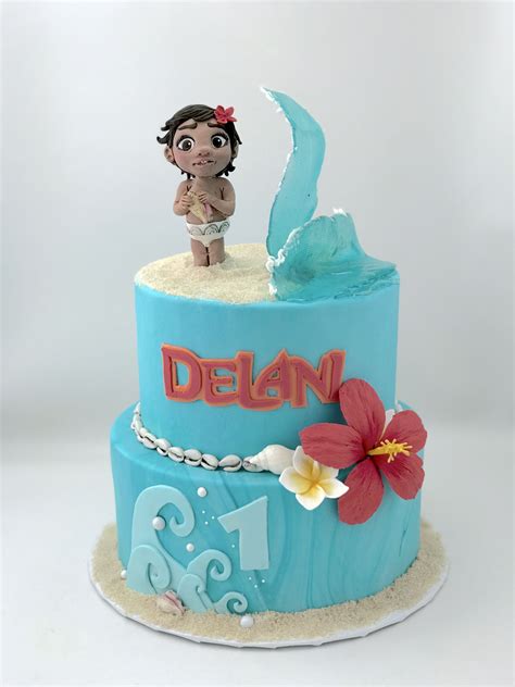 Baby Moana cake with sugar flowers and waves by Paris Custom Cakes (With images) | Cake business ...