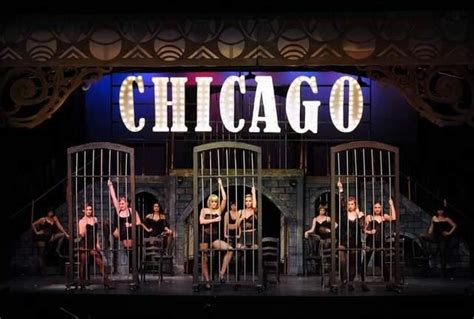 the cast of chicago on stage in jail