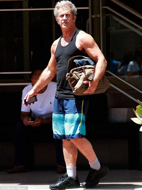 Mel Gibson, 58, shows off his bulging biceps after finishing up a ...