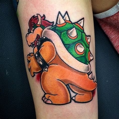 Gamerink on Instagram: “Bowser tattoo done by @sirinksalot. #tattoos #ink #videogametattoo # ...