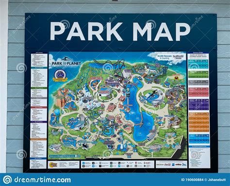 A Sign on a Building Wall that is the Park Map of Seaworld in Orlando ...