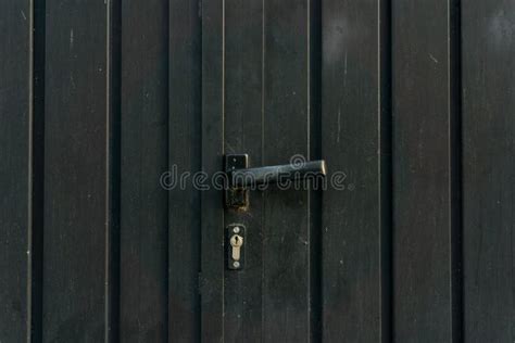 Metal Black Door with a Black Handle for Background. Black Metal Door ...