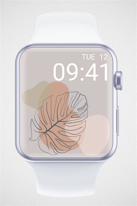 an apple watch with the time displayed on it's face and leaves in the ...