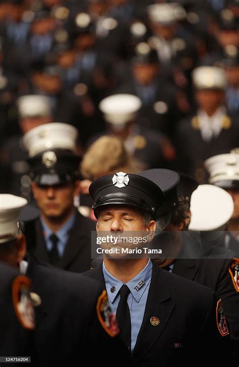 Firefighters attend a memorial service for firefighters killed on the ...