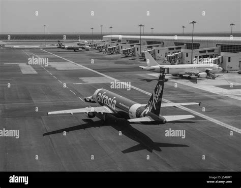 Airasia airplane Black and White Stock Photos & Images - Alamy