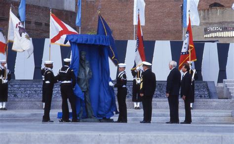 The Lone Sailor statue on the Navy Memorial is unveiled at the dedication of the Navy Memorial ...