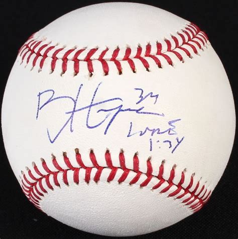 an autographed baseball with the number 945 on it