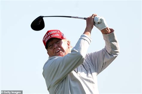 Donald Trump takes VERY bad swing and sends golf ball flying off-course ...