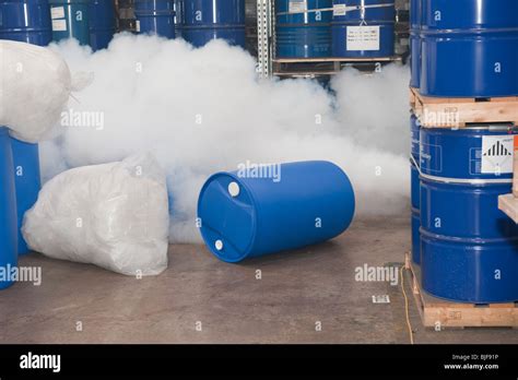 Chemical drum spillage and poisonous gas leak Stock Photo - Alamy