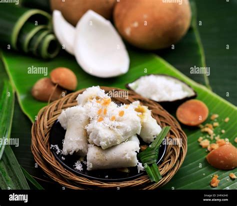 Kue Putu bambu, Traditional Food from Indonesia. Made from Steamed Rice Flour with Palm Sugar in ...