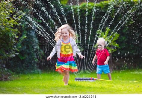 Child Playing Garden Sprinkler Preschooler Kid Stock Photo 316221941 ...