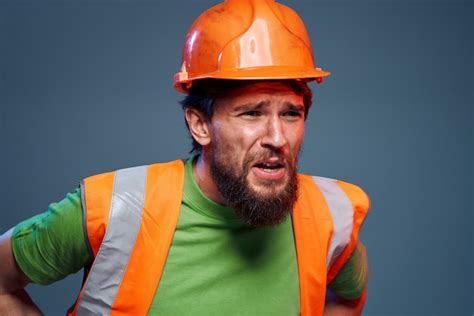 Premium Photo | Emotional builders orange hard hat safety work fatigue