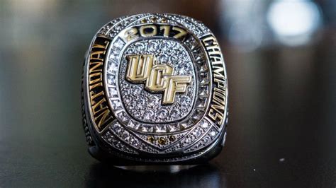 UCF unveils national championship sign, gives rings to players