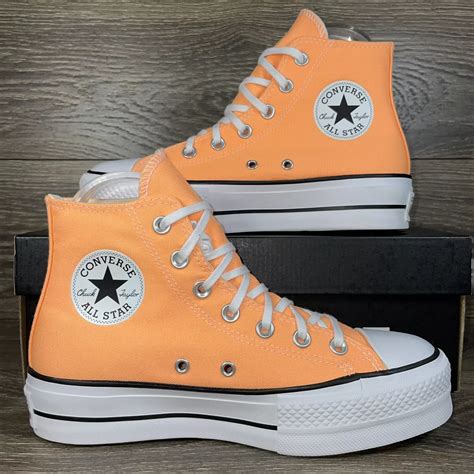 Orange Converse High Tops