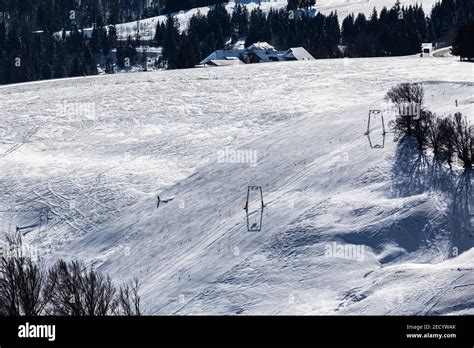 Freiburg, Germany. 14th Feb, 2021. A skier descends a slope on the Schauinsland. Good snow ...