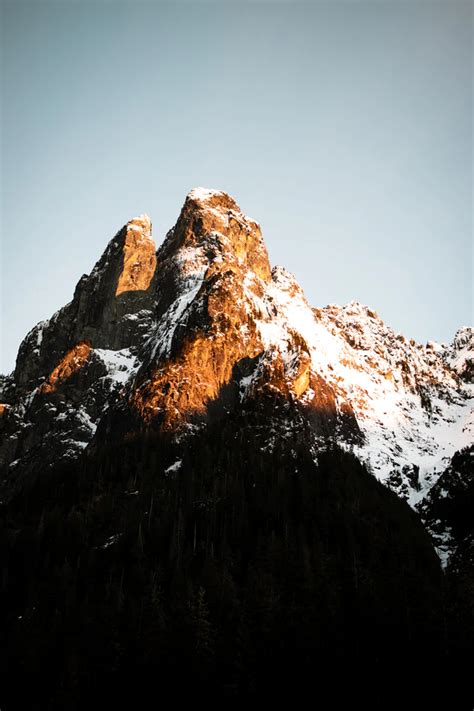 brown mountain covered with snow during daytime photo – Free Mountain ...