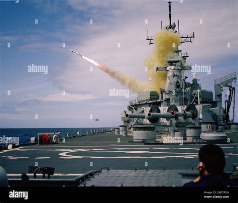 A Harpoon missile is launched from the battleship USS NEW JERSEY (BB 62) during tests on the ...