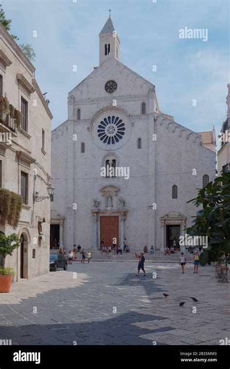 People at Bari Cathedral in Bari, Apulia, Italy. The cathedral was ...