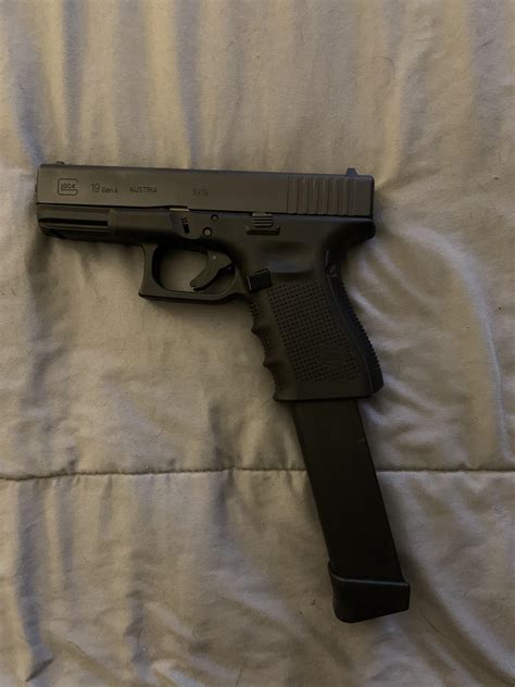 Got a 33 round magazine for my Glock G19 ;) : r/guns