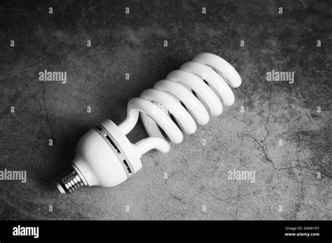 light bulb led , light from the lamp on dark background / energy saving idea , power saving ...