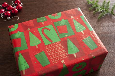 Photo of Beautifully wrapped Christmas present | Free christmas images