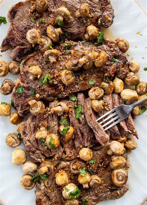 New York Strip Steak with Fried Garlic Mushrooms - The Kitchen Magpie