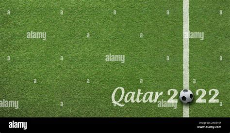 Soccer field grass top view background announcing soccer world cup tournament in Qatar 2022 ...