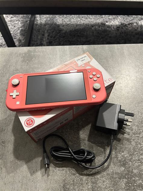 Nintendo Switch Lite Pink, Video Gaming, Video Game Consoles, Nintendo on Carousell