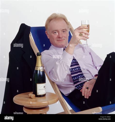 Actor Bruce Jones enjoying a champagne Stock Photo - Alamy