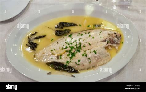 Dover sole in butter, lemon, white wine and sage Stock Photo - Alamy