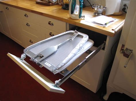Built-in ironing board in kitchen | Bungalow kitchens often … | Flickr